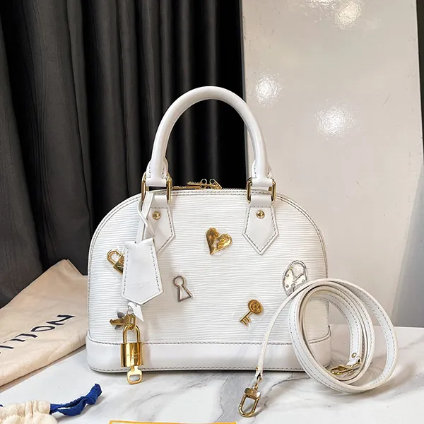 Túi Xách Nữ Louis Vuitton LV Epi Alma BB Lovelock Shoulder Bag White Bron M52885 Màu Trắng