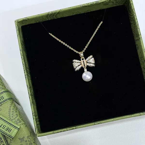 Dây Chuyền Nữ Kya Jewel Dazzling Pearl Bow PN29 Màu Vàng Trắng