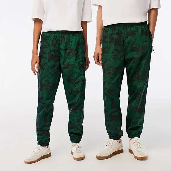 Quần Gió Unisex Lacoste x Netflix Printed Track Pants XH7342 - C50 Màu Xanh Green Size S