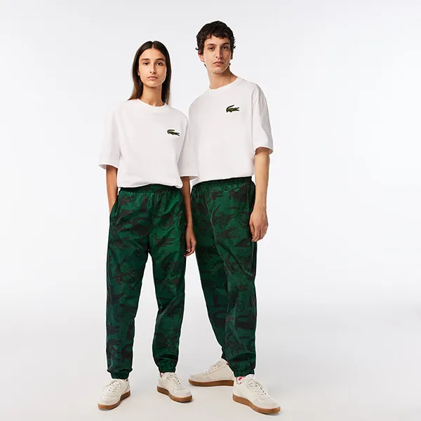 Quần Gió Unisex Lacoste x Netflix Printed Track Pants XH7342 - C50 Màu Xanh Green Size S
