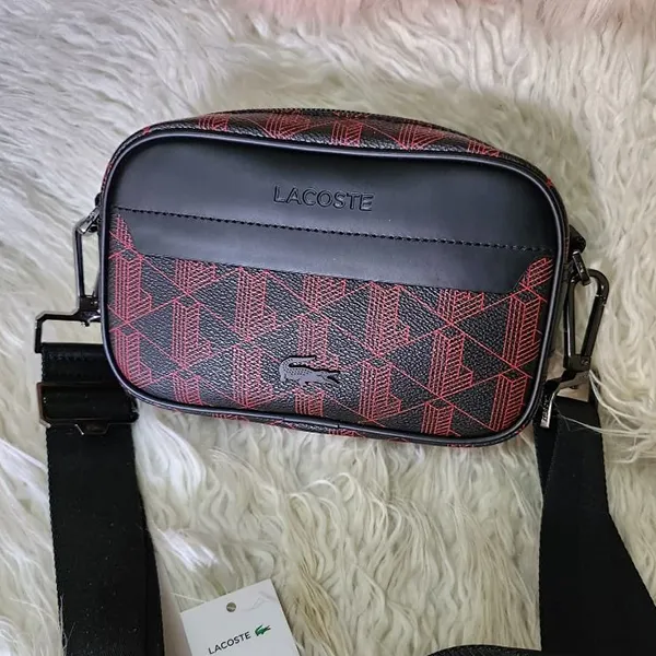 Túi Đeo Chéo Nam Lacoste Allover Monogram Reporter Bag NH3875LX J57 Màu Đen Phối Đỏ