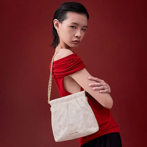 Túi Đeo Chéo Nữ Charles & Keith CNK Duo Jacquard Chain-Handle Two-Way Backpack Cream CK2-60782562 Màu Trắng Kem