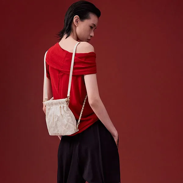 Túi Đeo Chéo Nữ Charles & Keith CNK Duo Jacquard Chain-Handle Two-Way Backpack Cream CK2-60782562 Màu Trắng Kem