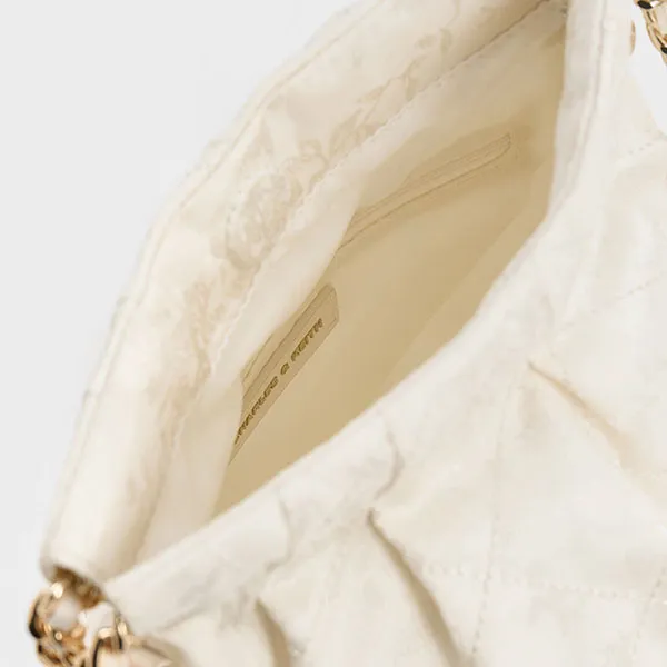 Túi Đeo Chéo Nữ Charles & Keith CNK Duo Jacquard Chain-Handle Two-Way Backpack Cream CK2-60782562 Màu Trắng Kem
