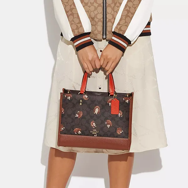 Túi Xách Nữ Coach Dempsey Carryall Bag In Signature Canvas With Hedgehog Print CC428 Màu Nâu Đen