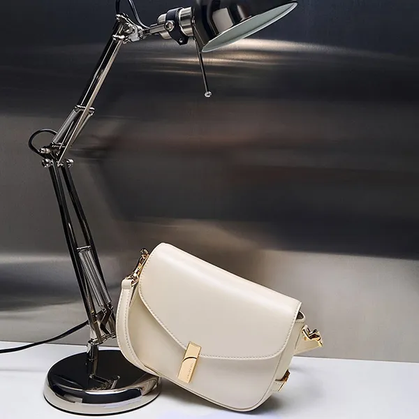 Túi Đeo Vai Nữ Charles & Keith CNK Aurelia Metallic-Accent Saddle Bag CK2-20782471 Màu Trắng
