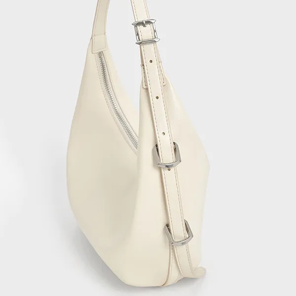 Túi Đeo Vai Nữ Charles & Keith CNK Bryna Metallic Curved Hobo Bag Cream CK2-40782526 Màu Kem - Túi xách - Vua Hàng Hiệu