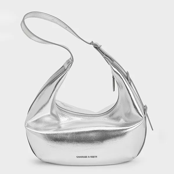 Túi Đeo Vai Nữ Charles & Keith CNK Bryna Metallic Curved Hobo Bag Silver CK2-40782526 Màu Bạc