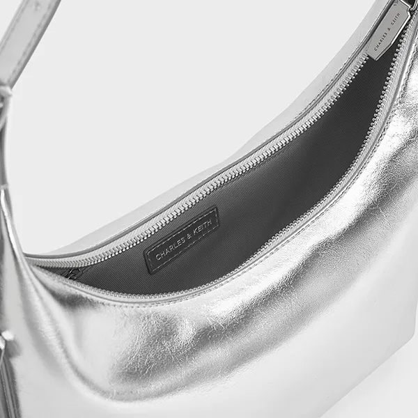 Túi Đeo Vai Nữ Charles & Keith CNK Bryna Metallic Curved Hobo Bag Silver CK2-40782526 Màu Bạc