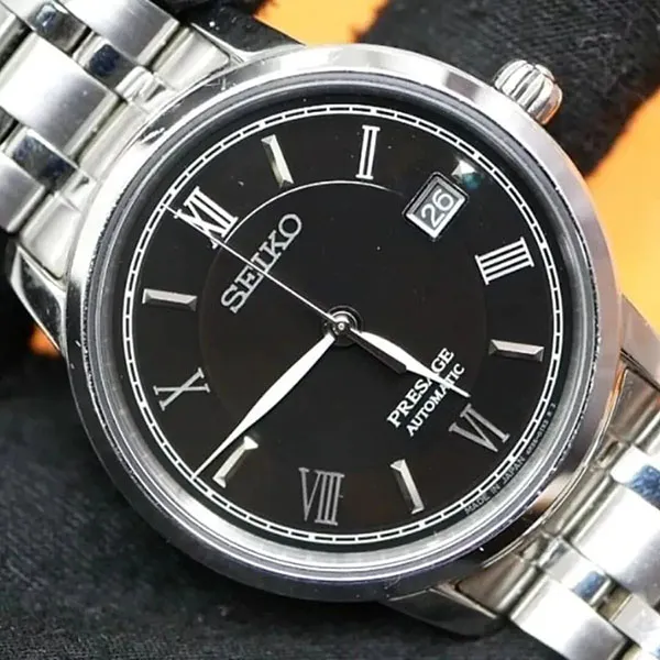 Đồng Hồ Nam Seiko Presage SRPF27J1 Sapphire Automatic Black Dial Màu Đen - Bạc