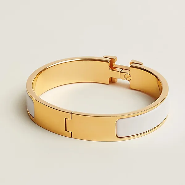 Vòng Đeo Tay Nữ Hermès Clic H Bracelet Blanc GHW PM Màu Vàng Trắng