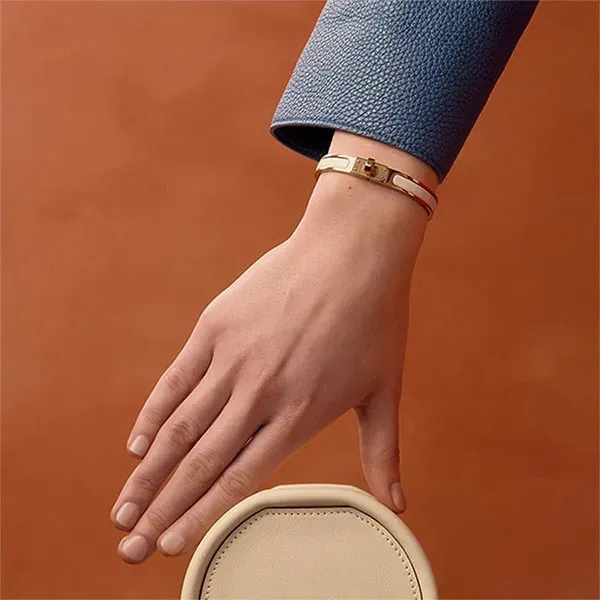 Vòng Đeo Tay Nữ Hermès Mini Clic Kelly Bracelet Cream Màu Vàng Hồng Phối Kem