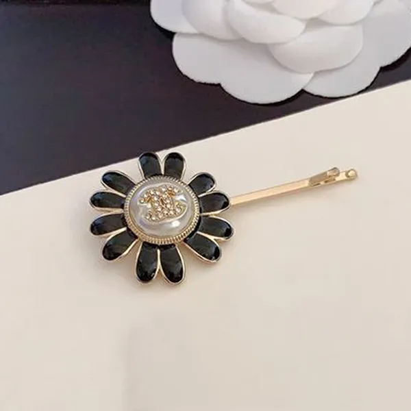 Kẹp Tóc Chanel Black Oil Drop Flower Hairpin Màu Đen Vàng - Phụ kiện - Vua Hàng Hiệu