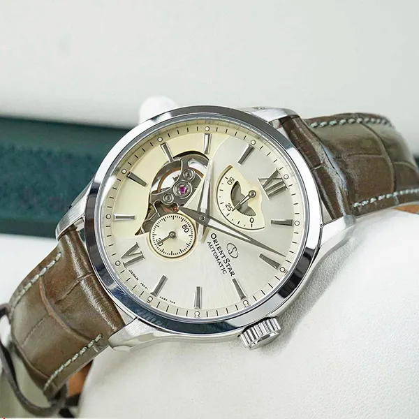 Đồng Hồ Nam Orient Star Layered Skeleton Re-AV0B10G00B Màu Nâu Be