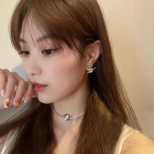 Khuyên Tai Nữ Chanel Double Logo Earrings Màu Vàng