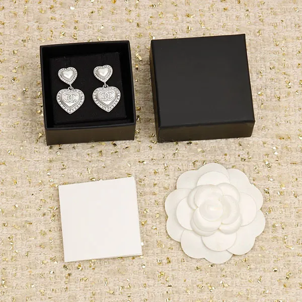 Khuyên Tai Nữ Chanel Double Heart Cc Diamonds Silver Earrings Màu Bạc - Trang sức - Vua Hàng Hiệu