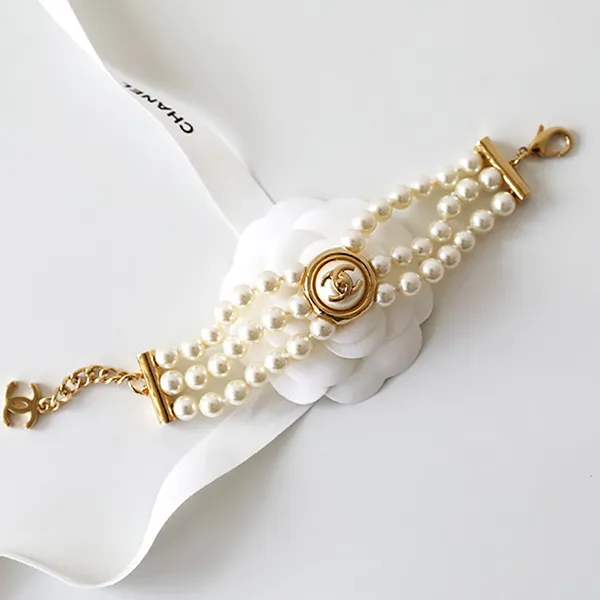 Vòng Đeo Tay Chanel Ngọc Trai CC Màu Trắng - Vàng - Trang sức - Vua Hàng Hiệu