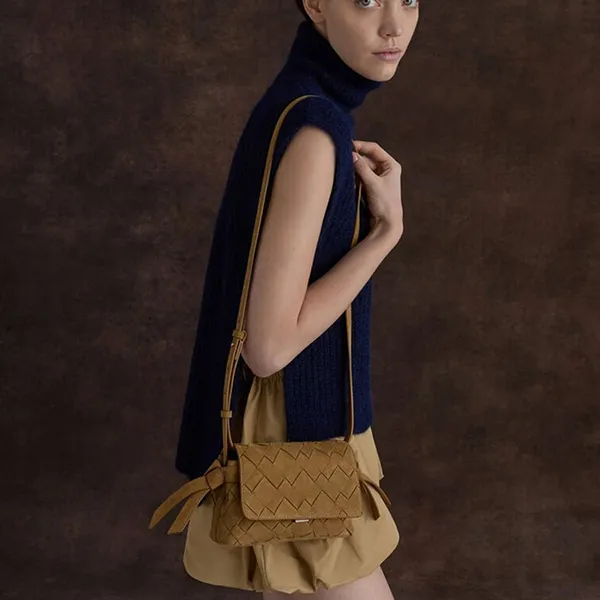 Túi Đeo Chéo Nữ Charles & Keith CNK Ivette Recycled Suede Woven Crossbody Bag Sahara Sand CK2-80151564-1 Màu Vàng Cát
