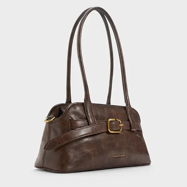 Túi Đeo Vai Nữ Charles & Keith CNK Victoria Studded Belted Elongated Shoulder Bag Distressed CK2-20271613 Màu Nâu Cafe