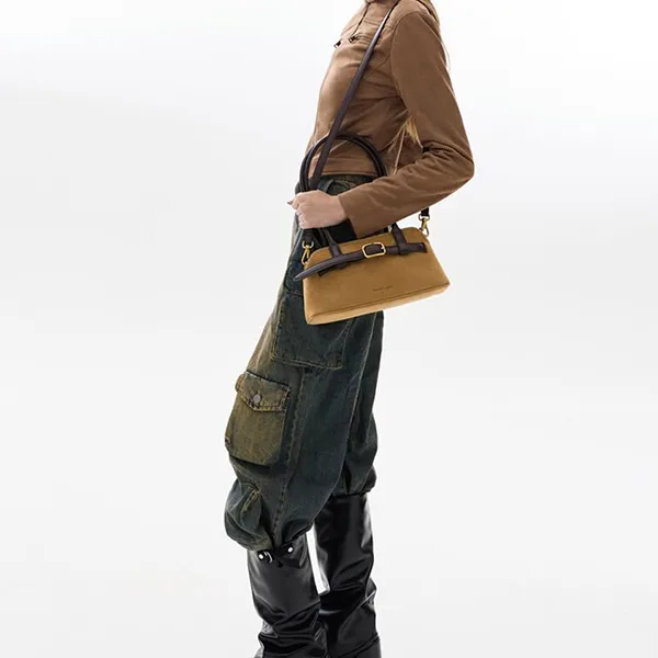 Túi Đeo Vai Nữ Charles & Keith CNK Victoria Studded Belted Elongated Shoulder Bag Sahara Sand CK2-20271613 Màu Vàng Cát