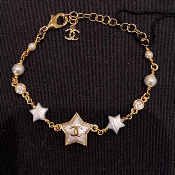Vòng Đeo Tay Nữ Chanel Bracelet Coco Mark Metal Strass Costume Pearl Star Gold ABC418 Màu Vàng Gold