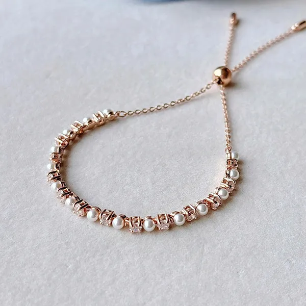Vòng Đeo Tay Nữ Swarovski Crystal Pearl Round Cuts White/ Rose Gold-Tone Plated 5729506 Màu Vàng Hồng