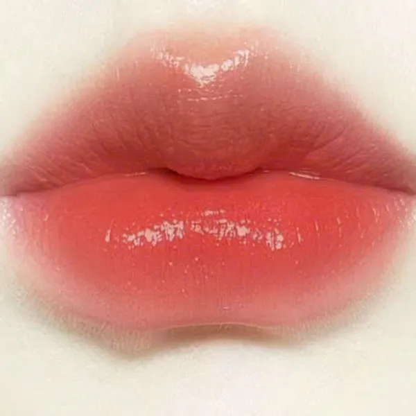 Son Dưỡng Chanel Rouge Coco Bloom 130 Blossom Màu Cam San Hô