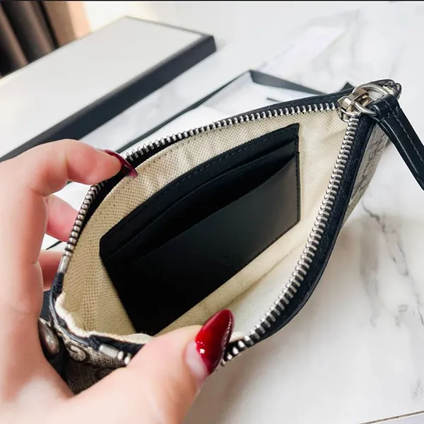 Túi Cầm Tay Unisex Gucci Beige GG Supreme Canvas Snake Print Wristlet Pouch Màu Be Đen