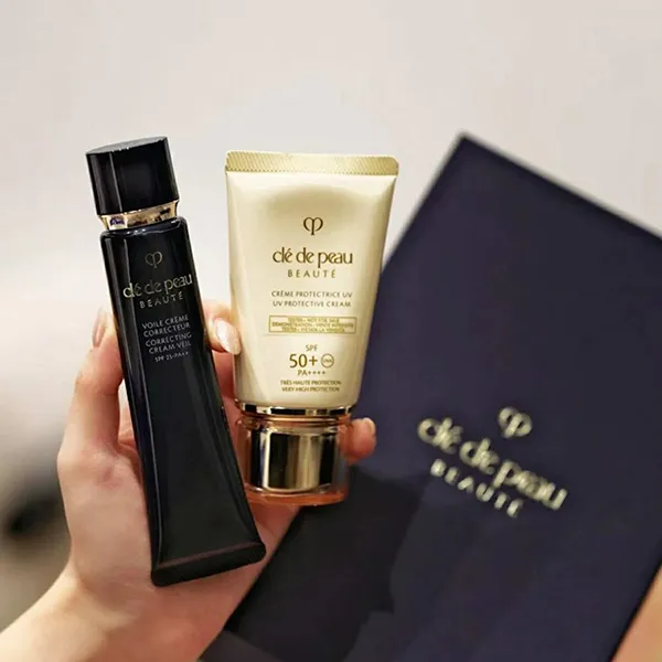Set Kem Chống Nắng Và Kem Lót Clé De Peau Beaute UV Protection Cream SPF 50g + Voile Creme Correcteur 40g