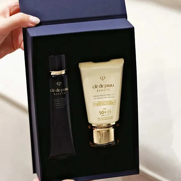 Set Kem Chống Nắng Và Kem Lót Clé De Peau Beaute UV Protection Cream SPF 50g + Voile Creme Correcteur 40g