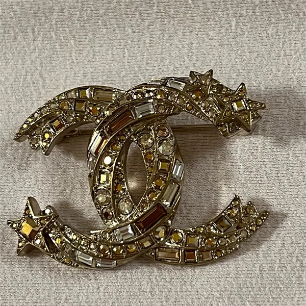 Cài Áo Nữ Chanel Fully Fitted Comet Brooch Màu Vàng Gold