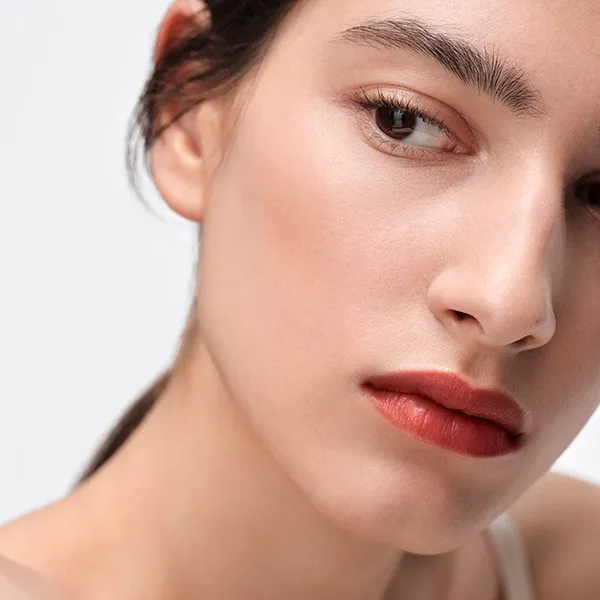 Son Dưỡng Prada Light Glowing Lipcolor U020 Rosso Màu Đỏ Cam Đất