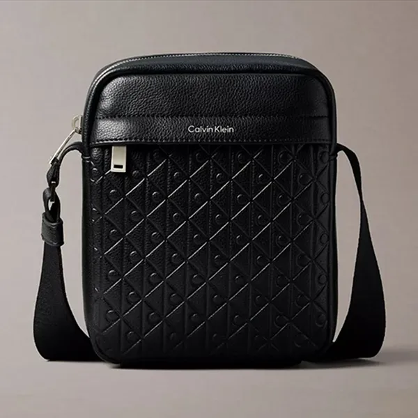 Túi Đeo Chéo Nam Calvin Klein CK Embossed Allover Monogram Reporter Bag 4D3204G - 001 Màu Đen