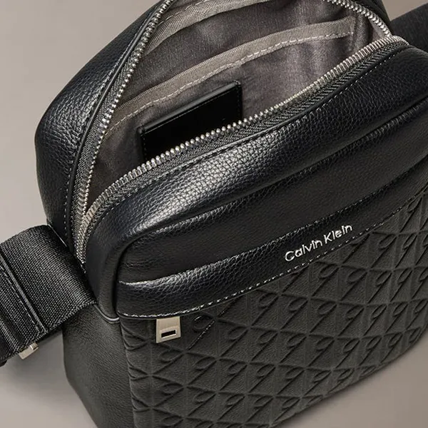 Túi Đeo Chéo Nam Calvin Klein CK Embossed Allover Monogram Reporter Bag 4D3204G - 001 Màu Đen