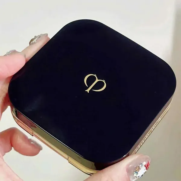 Set Case + Lõi Phấn Nước Clé De Peau Radiant Cushion Foundation Dewy SPF 25 PA+++ Tone I10