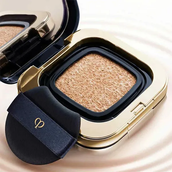 Set Case + Lõi Phấn Nước Clé De Peau Radiant Cushion Foundation Dewy SPF 25 PA+++ Tone I10