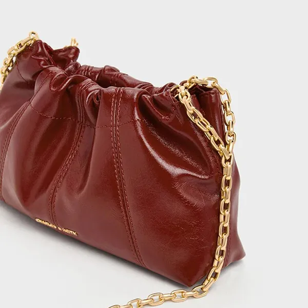 Túi Đeo Chéo Nữ Charles & Keith CNK Ciara Ruched Crossbody Bag CK2-80151612 Burgundy Màu Đỏ