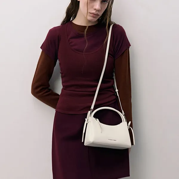 Túi Đeo Chéo Nữ Charles & Keith CNK Hazel Bow Top Handle Bag - Cream CK2-30160255 Màu Trắng Kem