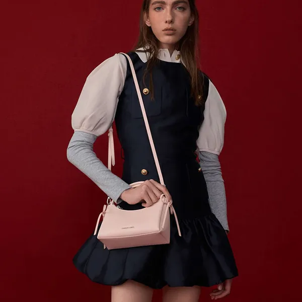 Túi Đeo Chéo Nữ Charles & Keith CNK Hazel Bow Top Handle Bag - Soft Pink CK2-30160255 Màu Hồng