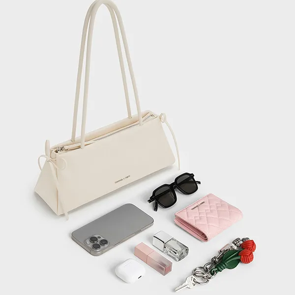 Túi Đeo Vai Nữ Charles & Keith CNK Hazel Bow Elongated Shoulder Bag - Cream CK2-20160193 Màu Kem