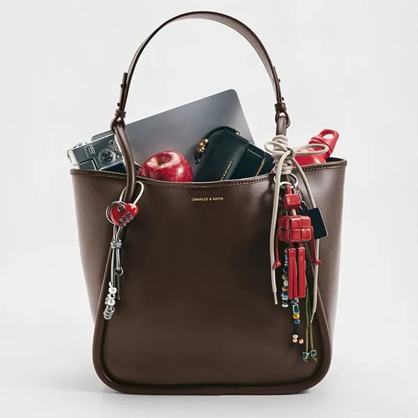 Túi Tote Nữ Charles & Keith CNK Lyla Tubular Slouchy Trapezoid Tote Bag Dark Brown CK2-30781483 Màu Nâu Sẫm