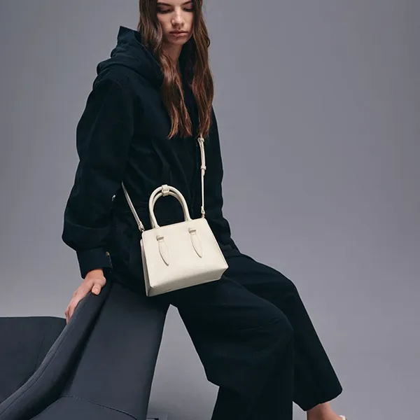 Túi Xách Tay Nữ Charles & Keith CNK Allyn Trapezoid Handbag Cream CK2-30782733 Màu Kem