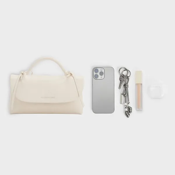 Túi Xách Tay Nữ Charles & Keith CNK Hazel Bow Rectangular Clutch Bag Cream CK6-30770716 Màu Kem