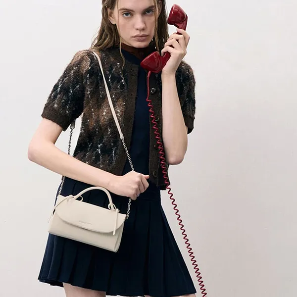 Túi Xách Tay Nữ Charles & Keith CNK Hazel Bow Rectangular Clutch Bag Cream CK6-30770716 Màu Kem