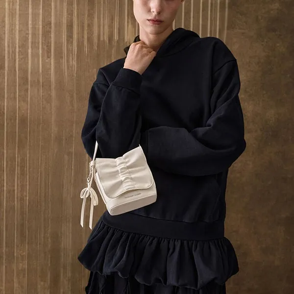 Túi Xách Tay Nữ Charles & Keith CNK Kadee Ruched Bow-Charm Mini Bag Cream CK6-40151554 Màu Kem