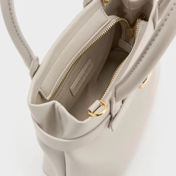 Túi Xách Tay Nữ Charles & Keith CNK Mini Behn Belted Trapezoid Handbag Shell Grey CK2-30782821 Màu Xám Nhạt