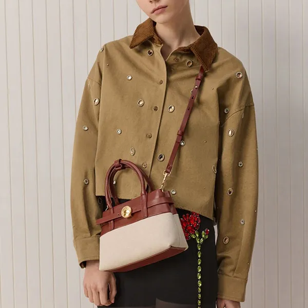 Túi Xách Tay Nữ Charles & Keith CNK Mini Behn Canvas Belted Trapezoid Handbag Brick CK2-30782821 Màu Be Nâu