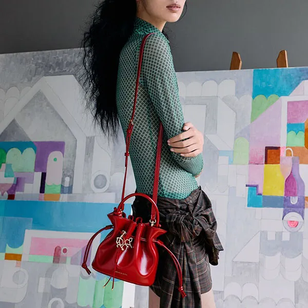 Túi Xách Tay Nữ Charles & Keith CNK Sammie Horse-Motif Drawstring Bucket Bag CK2-10271696 Tomato Red Màu Đỏ