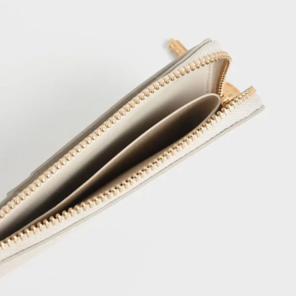 Ví Nữ Charles & Keith CNK Rectangular Zip-Around Wallet CK6-11200013-1 Cream Màu Kem