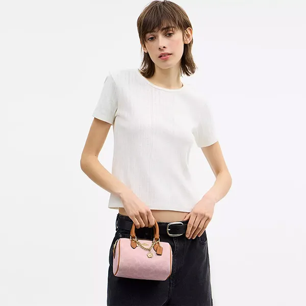 Túi Đeo Chéo Nữ Coach Mini Rowan Crossbody Bag In Signature Canvas With Charms CEK79 Gold/Powder Pink Màu Hồng